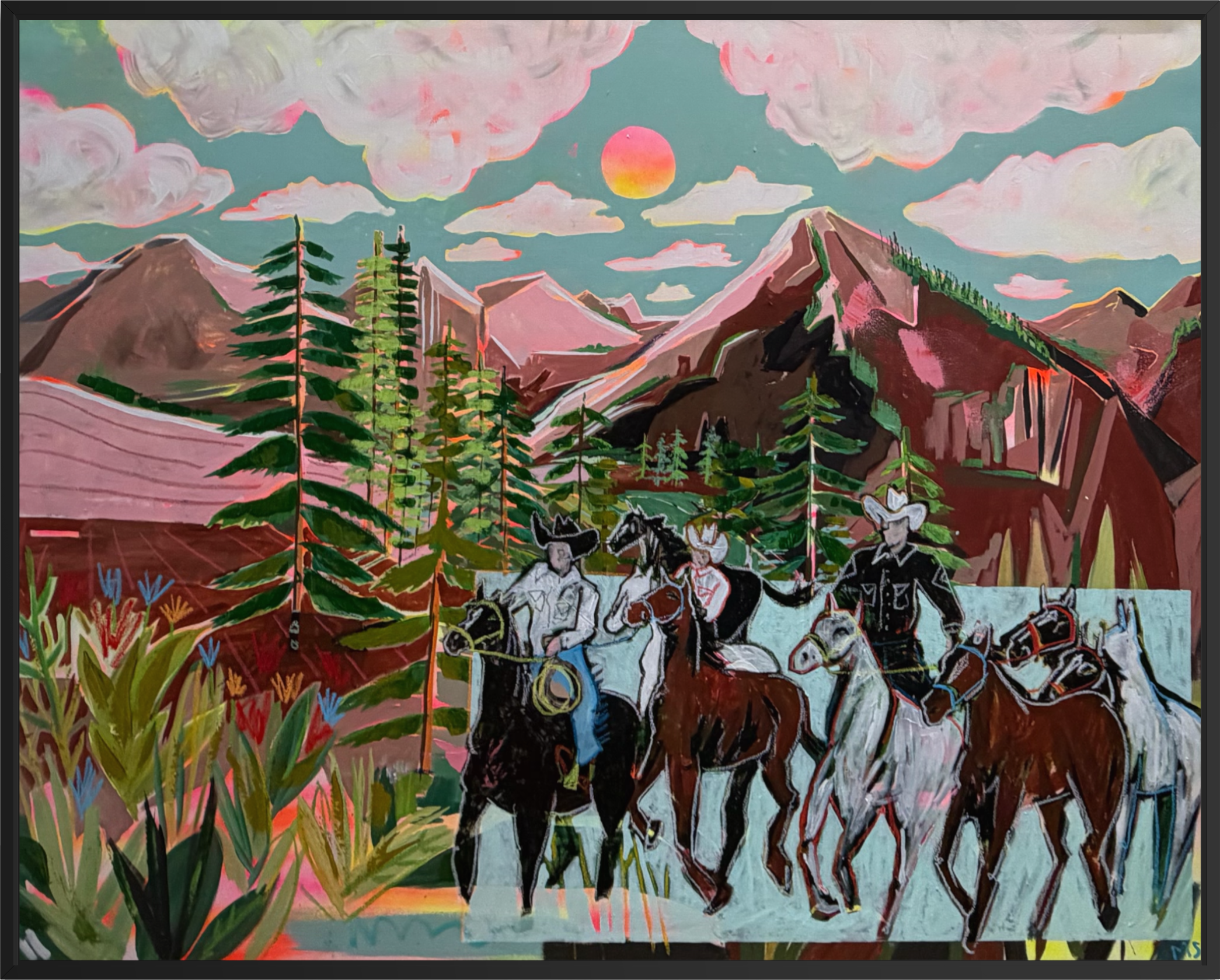 A framed colorful painting depicting a group of cowboys riding horses across a landscape.