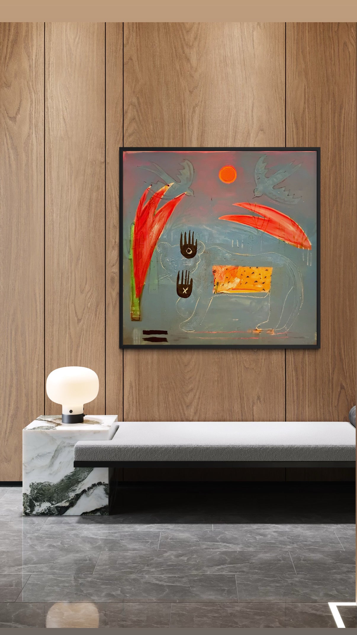Abstract painting on a wooden wall above a modern white sofa with marble end table.