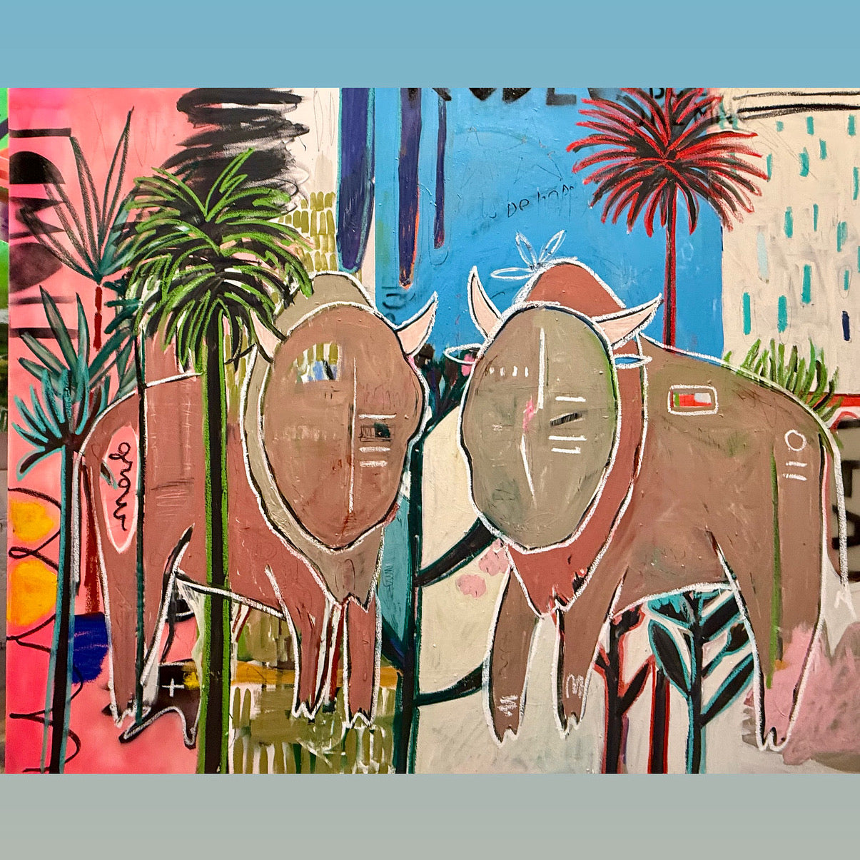Colorful abstract painting of two elephants and tropical plants on a blue background.