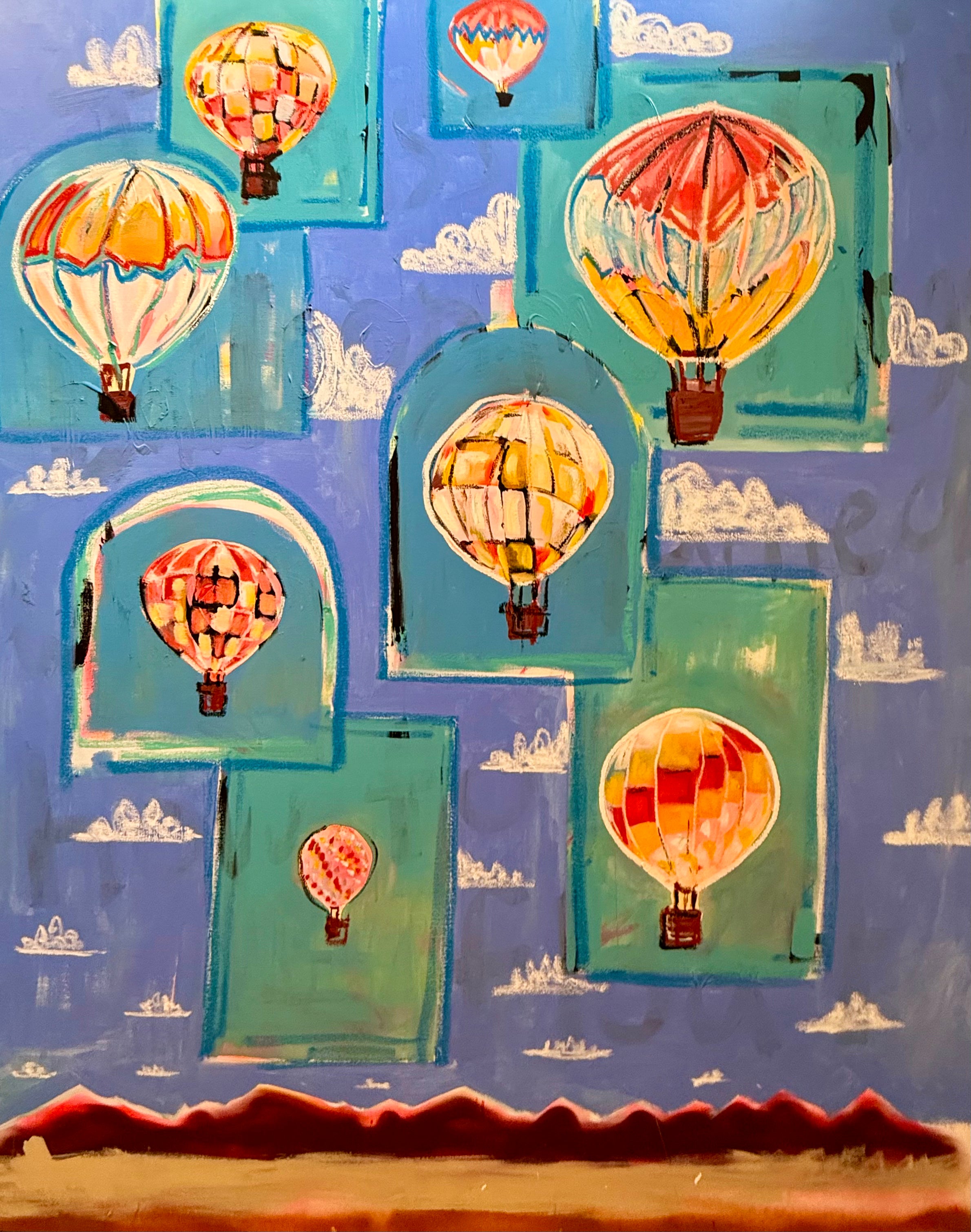 Colorful hot air balloon painting with multiple balloons floating above a blue landscape.