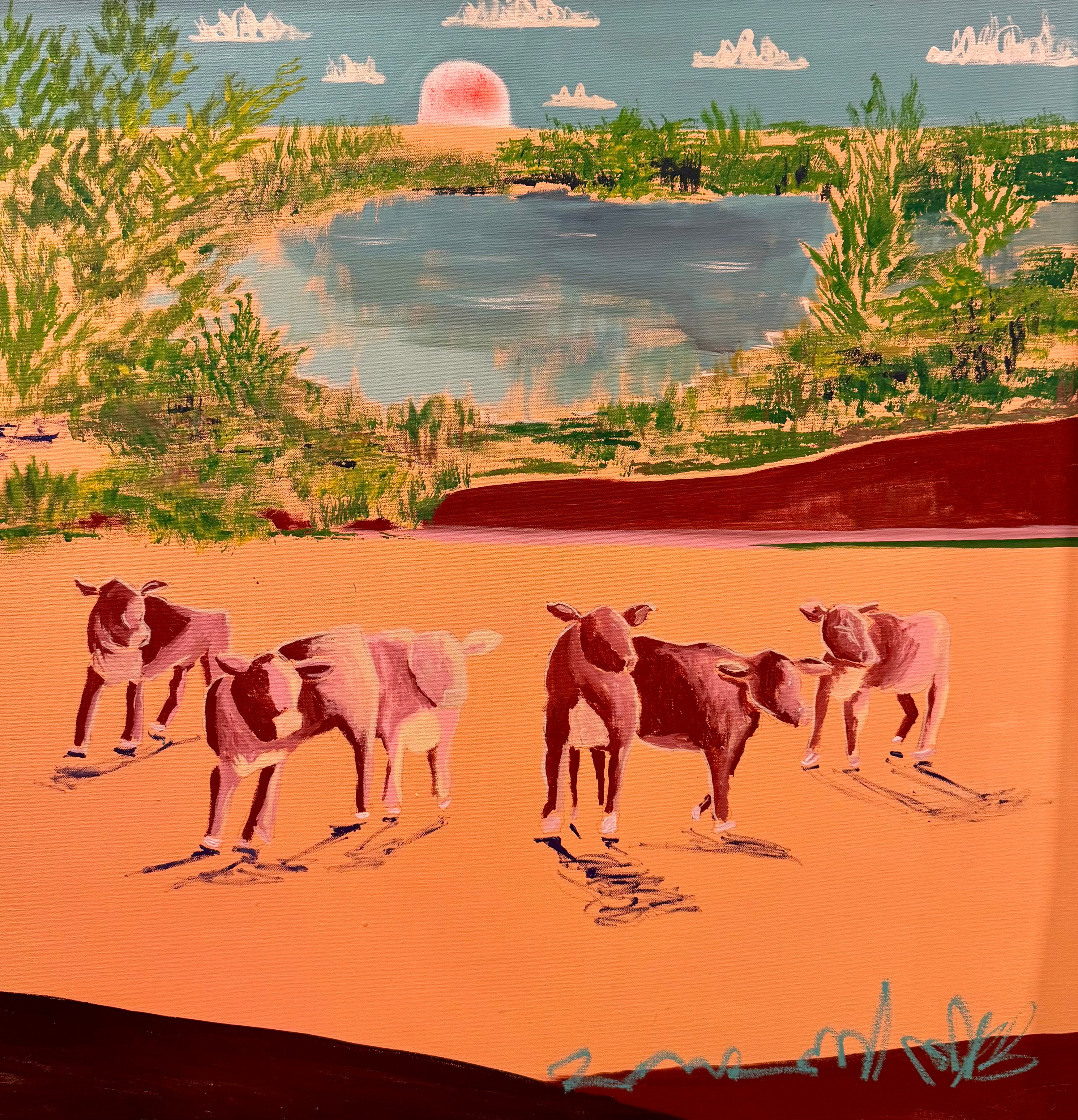 Cow wall art showing a group of cows in a colorful landscape with fields, water, vegetation, and a sunset.
