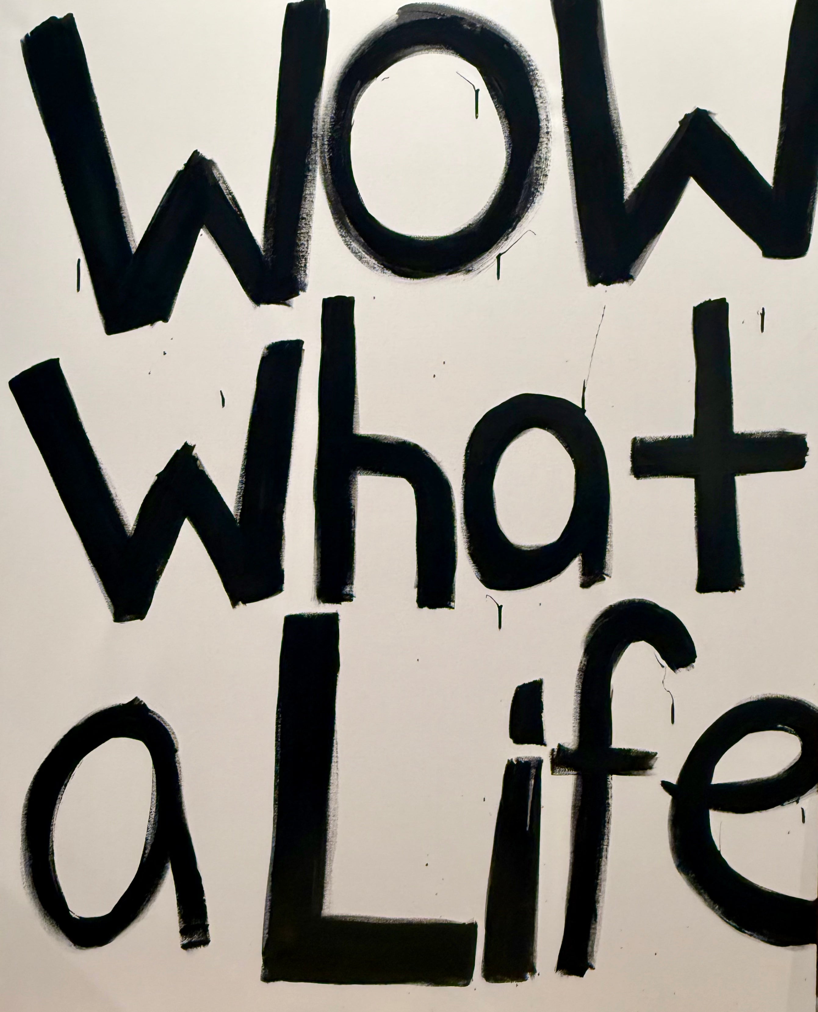  motivational canvas featuring black text on a white background with the phrase 'WOW what a life'.