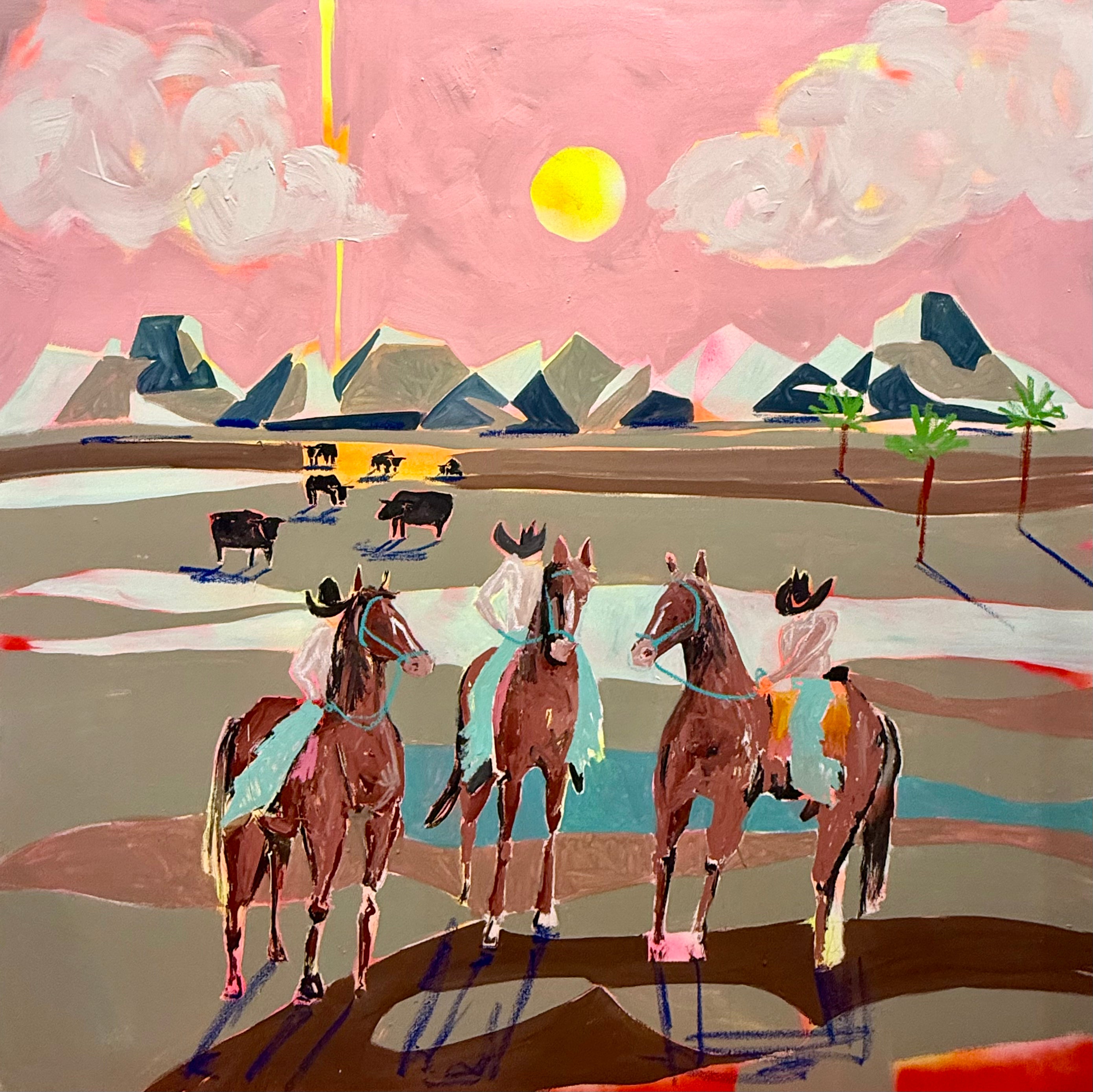running horses wall art of three horses with riders in a desert landscape with mountains and clouds.